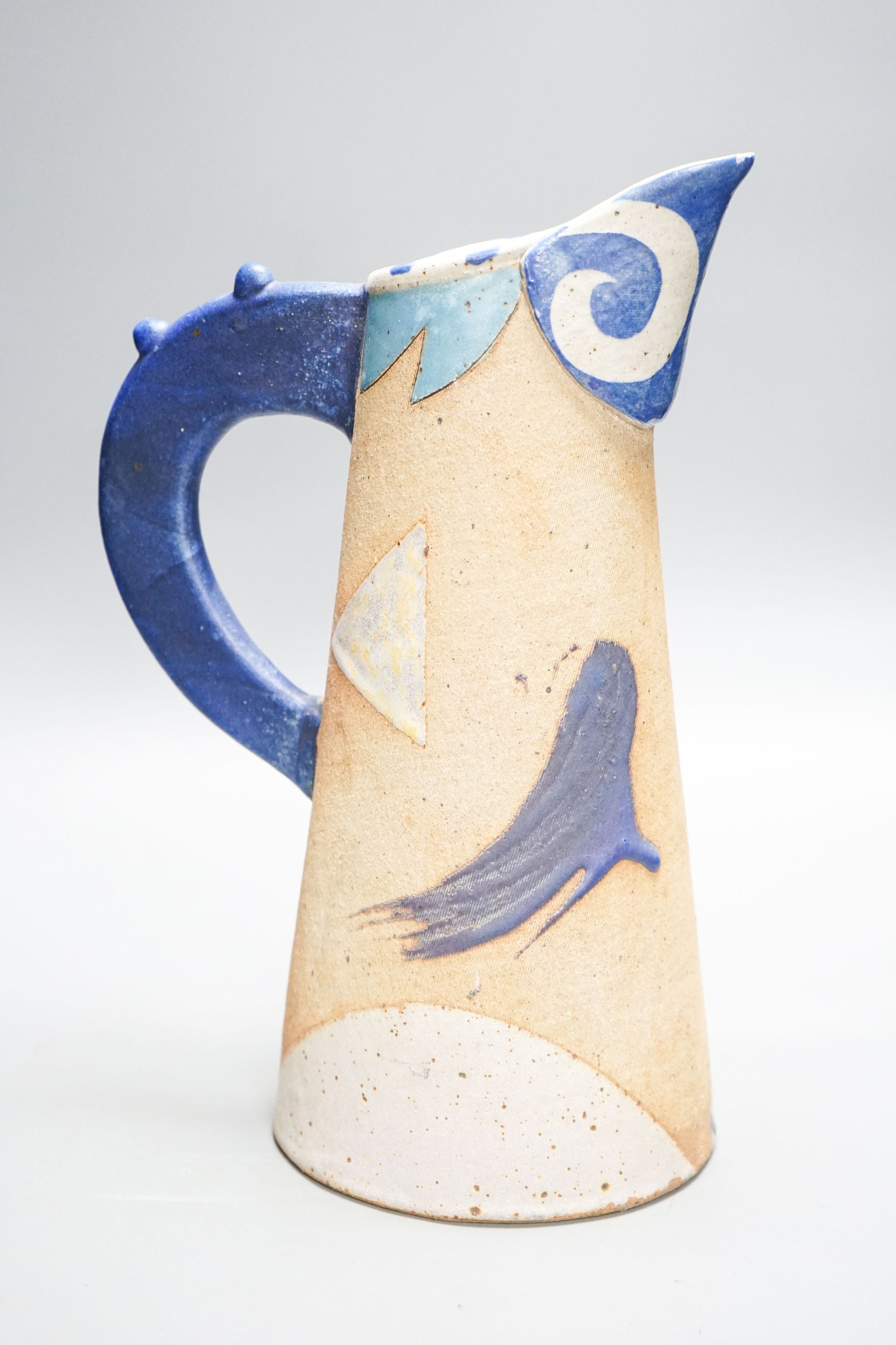 Jill Fanshawe Kato (b.1943), a tall slip decorated stoneware jug 35cm